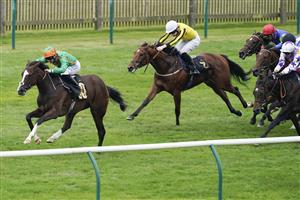 NEWMARKET, ENGLAND - SEPTEMBER 25: Pat Dobbs riding Siamsa win The Blandford Bloodstock Maiden Fillies' Stakes at Newmarket Racecourse on September 25, 2021 in Newmarket, England. (Photo by Alan Crowhurst/Getty Images)
