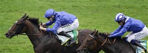 NEWMARKET, ENGLAND - SEPTEMBER 25: Jamie Spencer riding Bedouin's Story (L, blue) win The bet365 Cambridgeshire Handicap at Newmarket Racecourse on September 25, 2021 in Newmarket, England. (Photo by Alan Crowhurst/Getty Images)