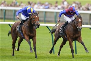 NEWMARKET, ENGLAND - SEPTEMBER 25: Ryan Moore riding Tenebrism (R) win The Juddmonte Cheveley Park Stakes at Newmarket Racecourse on September 25, 2021 in Newmarket, England. (Photo by Alan Crowhurst/Getty Images)