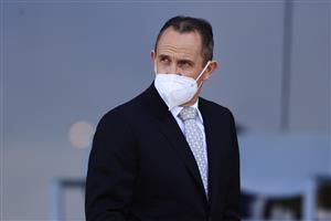 SYDNEY, AUSTRALIA - SEPTEMBER 25: Trainer Chris Waller looks on after winning race 5 the Petaluma Heritage Stakes with Home Affairs during Sydney Racing on Golden Rose Day at Rosehill Gardens on September 25, 2021 in Sydney, Australia. (Photo by Mark Evans/Getty Images)