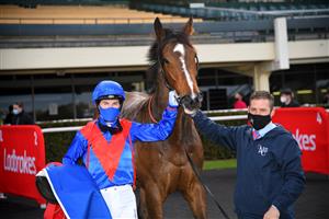 MELBOURNE, AUSTRALIA - SEPTEMBER 25: Craig Williams riding Zaaki after winning Race 7, the Quayclean Underwood Stakes, during Melbourne Racing at Sandown Racecourse on September 25, 2021 in Melbourne, Australia. (Photo by Vince Caligiuri/Getty Images)