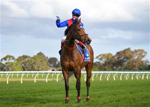 MELBOURNE, AUSTRALIA - SEPTEMBER 25: Craig Williams riding Zaaki after winning Race 7, the Quayclean Underwood Stakes, during Melbourne Racing at Sandown Racecourse on September 25, 2021 in Melbourne, Australia. (Photo by Vince Caligiuri/Getty Images)