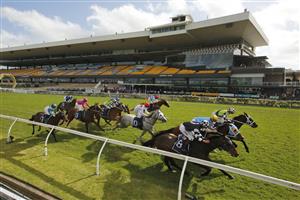 SYDNEY, AUSTRALIA - SEPTEMBER 25: Glyn Schofield on Yonkers (green), wins race 6 the Ned Whisky Shannon Stakes during Sydney Racing on Golden Rose Day at Rosehill Gardens on September 25, 2021 in Sydney, Australia. (Photo by Mark Evans/Getty Images)