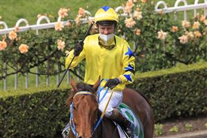 SYDNEY, AUSTRALIA - SEPTEMBER 25: Kerrin McEvoy on The Fossil returns to scale after winning race 2 the TAB highway Class 2 Handicap during Sydney Racing on Golden Rose Day at Rosehill Gardens on September 25, 2021 in Sydney, Australia. (Photo by Mark Evans/Getty Images)