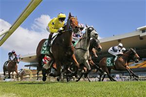 SYDNEY, AUSTRALIA - SEPTEMBER 25: Kerrin McEvoy on The Fossil (yellow), wins race 2 the TAB highway Class 2 Handicap during Sydney Racing on Golden Rose Day at Rosehill Gardens on September 25, 2021 in Sydney, Australia. (Photo by Mark Evans/Getty Images)