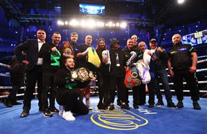 LONDON, ENGLAND - SEPTEMBER 25: Oleksandr Usyk celebrates with their team after being crowned the new World Champion following the Heavyweight Title Fight between Anthony Joshua and Oleksandr Usyk at Tottenham Hotspur Stadium on September 25, 2021 in London, England. (Getty Images)