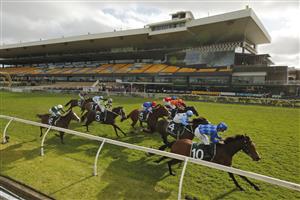 SYDNEY, AUSTRALIA - SEPTEMBER 25: Tim Clark on Vangelic (royal blue) wins race 7 the Keenland Golden Pendant during Sydney Racing on Golden Rose Day at Rosehill Gardens on September 25, 2021 in Sydney, Australia. (Photo by Mark Evans/Getty Images)