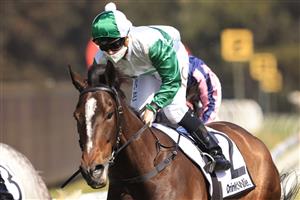 SYDNEY, AUSTRALIA - SEPTEMBER 25: Tim Clark on Entente (green) wins race 4 the Drinkwise Colin Stephen Quality during Sydney Racing on Golden Rose Day at Rosehill Gardens on September 25, 2021 in Sydney, Australia. (Photo by Mark Evans/Getty Images)