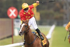 SYDNEY, AUSTRALIA - SEPTEMBER 25: Tim Clark on In The Congo wins race 8 the XXXX Golden Rose during Sydney Racing on Golden Rose Day at Rosehill Gardens on September 25, 2021 in Sydney, Australia. (Photo by Mark Evans/Getty Images)