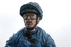 ASCOT, ENGLAND - OCTOBER 02: A muddy Richard Kingscote after race one at Ascot Racecourse on October 02, 2021 in Ascot, England. (Photo by Alan Crowhurst/Getty Images)