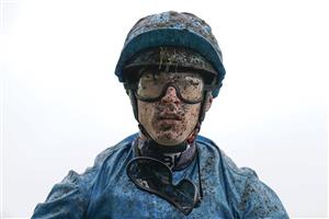 ASCOT, ENGLAND - OCTOBER 02: A muddy Richard Kingscote after race one at Ascot Racecourse on October 02, 2021 in Ascot, England. (Photo by Alan Crowhurst/Getty Images)
