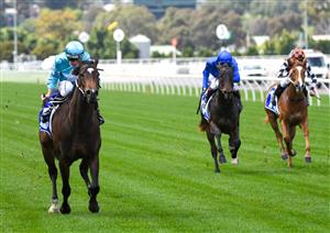 MELBOURNE, AUSTRALIA - OCTOBER 02: Damian Lane riding Get In The Spirit winning Race 1, the Darley Maribyrnong Trial Stakes during Melbourne Racing at Flemington Racecourse on October 02, 2021 in Melbourne, Australia. (Photo by Vince Caligiuri/Getty Images)