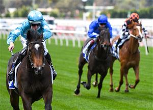MELBOURNE, AUSTRALIA - OCTOBER 02: Damian Lane riding Get In The Spirit winning Race 1, the Darley Maribyrnong Trial Stakes during Melbourne Racing at Flemington Racecourse on October 02, 2021 in Melbourne, Australia. (Photo by Vince Caligiuri/Getty Images)