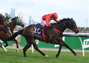 MELBOURNE, AUSTRALIA - OCTOBER 02: Dean Yendall riding Justacanta winning Race 9, the Mcgregor Portables Paris Lane Stakes, during Melbourne Racing at Flemington Racecourse on October 02, 2021 in Melbourne, Australia. (Photo by Vince Caligiuri/Getty Images)