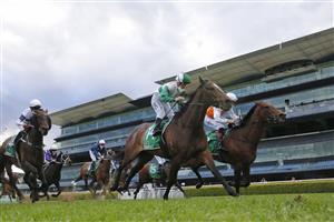 SYDNEY, AUSTRALIA - OCTOBER 02: Hugh Bowman on Montefilia (R), wins race 9 the Heineken Metropolitan during Sydney Racing on Epsom Day at Royal Randwick Racecourse on October 02, 2021 in Sydney, Australia. (Photo by Mark Evans/Getty Images)