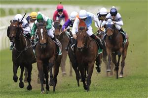 SYDNEY, AUSTRALIA - OCTOBER 02: Hugh Bowman on Montefilia (orange/blue), wins race 9 the Heineken Metropolitan during Sydney Racing on Epsom Day at Royal Randwick Racecourse on October 02, 2021 in Sydney, Australia. (Photo by Mark Evans/Getty Images)
