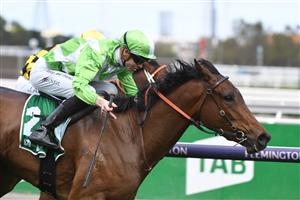 MELBOURNE, AUSTRALIA - OCTOBER 02: Jye McNeil riding Elusive Express winning Race 3, the Tab Edward Manifold Stakes, during Melbourne Racing at Flemington Racecourse on October 02, 2021 in Melbourne, Australia. (Photo by Vince Caligiuri/Getty Images)