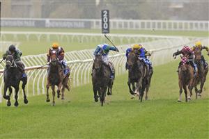 SYDNEY, AUSTRALIA - OCTOBER 02: Regan Bayliss on Never Been Kissed wins race 7 the Darley Flight Stakes during Sydney Racing on Epsom Day at Royal Randwick Racecourse on October 02, 2021 in Sydney, Australia. (Photo by Mark Evans/Getty Images)
