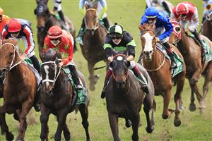 SYDNEY, AUSTRALIA - OCTOBER 02: Regan Bayliss on Private Eye (green/black) wins race 8 the TAB Epsom during Sydney Racing on Epsom Day at Royal Randwick Racecourse on October 02, 2021 in Sydney, Australia. (Photo by Mark Evans/Getty Images)