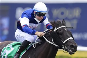 SYDNEY, AUSTRALIA - OCTOBER 02: Tommy Berry on Wairere Falls wins race 4 the TAB handicap during Sydney Racing on Epsom Day at Royal Randwick Racecourse on October 02, 2021 in Sydney, Australia. (Photo by Mark Evans/Getty Images)