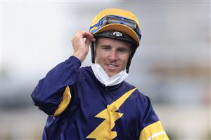 SYDNEY, AUSTRALIA - OCTOBER 02: Tommy Berry on Masked Crusader returns to scale after winning race 6 the ACY Securities Premiere Stakes during Sydney Racing on Epsom Day at Royal Randwick Racecourse on October 02, 2021 in Sydney, Australia. (Photo by Mark Evans/Getty Images)
