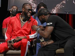 LAS VEGAS, NEVADA - OCTOBER 06: Deontay Wilder (L) talks with his head coach Malik Scott during a news conference at MGM Grand Garden Arena on October 6, 2021 in Las Vegas, Nevada. Wilder will challenge WBC heavyweight champion Tyson Fury for his title on October 9 at T-Mobile Arena in Las Vegas. (Getty Images)