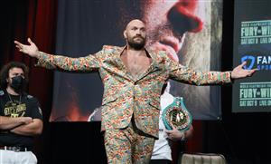LAS VEGAS, NEVADA - OCTOBER 06: WBC heavyweight champion Tyson Fury gestures during a news conference at MGM Grand Garden Arena on October 6, 2021 in Las Vegas, Nevada. Fury will defend his title against Deontay Wilder on October 9 at T-Mobile Arena in Las Vegas. (Getty Images)