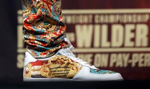 LAS VEGAS, NEVADA - OCTOBER 06: A shoe worn by WBC heavyweight champion Tyson Fury is shown during a news conference at MGM Grand Garden Arena on October 6, 2021 in Las Vegas, Nevada. Fury will defend his title against Deontay Wilder on October 9 at T-Mobile Arena in Las Vegas. (Getty Images)