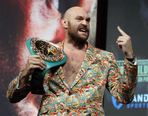 LAS VEGAS, NEVADA - OCTOBER 06: WBC heavyweight champion Tyson Fury gestures during a news conference at MGM Grand Garden Arena on October 6, 2021 in Las Vegas, Nevada. Fury will defend his title against Deontay Wilder on October 9 at T-Mobile Arena in Las Vegas. (Getty Images)