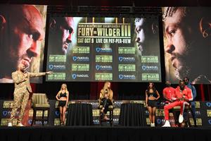 British boxer Tyson Fury (L) and challenger US boxer Deontay Wilder attend a press conference for their WBC heavyweight championship fight, October 6, 2021 at the MGM Grand Garden Arena in Las Vegas, Nevada ahead of their October 9, 2021 fight. (Getty Images)