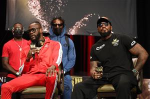 US boxer Deontay Wilder (L) and his coach Malik Scott attend a news conference at the MGM Grand Garden Arena, October 6, 2021 in Las Vegas, Nevada. - Wilder will challenge WBC heavyweight champion Tyson Fury of Great Britain for his title on October 9, 2021 in Las Vegas (Getty Images)
