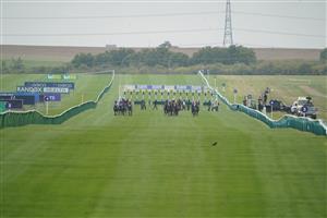 NEWMARKET, ENGLAND - OCTOBER 08: A general view as runners in The Newmarket Academy Godolphin Beacon Project Cornwallis Stakes make their way down the track at Newmarket Racecourse on October 08, 2021 in Newmarket, England. (Photo by Alan Crowhurst/Getty Images)