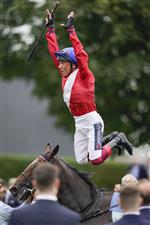 NEWMARKET, ENGLAND - OCTOBER 08: Frankie Dettori celebrates after riding Inspiral to win The bet365 Fillies' Mile at Newmarket Racecourse on October 08, 2021 in Newmarket, England. (Photo by Alan Crowhurst/Getty Images)