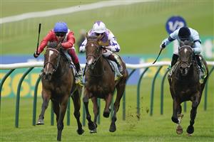 NEWMARKET, ENGLAND - OCTOBER 08: Frankie Dettori riding Inspiral (red) win The bet365 Fillies' Mile at Newmarket Racecourse on October 08, 2021 in Newmarket, England. (Photo by Alan Crowhurst/Getty Images)