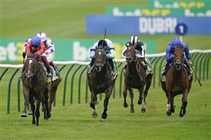 NEWMARKET, ENGLAND - OCTOBER 08: Frankie Dettori riding Inspiral (red) win The bet365 Fillies' Mile at Newmarket Racecourse on October 08, 2021 in Newmarket, England. (Photo by Alan Crowhurst/Getty Images)