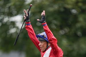 NEWMARKET, ENGLAND - OCTOBER 08: Frankie Dettori celebrates after riding Inspiral to win The bet365 Fillies' Mile at Newmarket Racecourse on October 08, 2021 in Newmarket, England. (Photo by Alan Crowhurst/Getty Images)