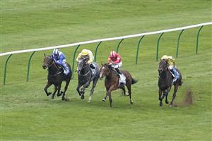 NEWMARKET, ENGLAND - OCTOBER 08: James Doyle riding Fast Attack (red) win The Godolphin Lifetime Care Oh So Sharp Stakes from Jim Crowley and Allayaali (blue) at Newmarket Racecourse on October 08, 2021 in Newmarket, England. (Photo by Alan Crowhurst/Getty Images)