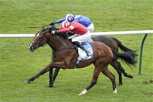 NEWMARKET, ENGLAND - OCTOBER 08: James Doyle riding Fast Attack (red) win The Godolphin Lifetime Care Oh So Sharp Stakes from Jim Crowley and Allayaali (blue) at Newmarket Racecourse on October 08, 2021 in Newmarket, England. (Photo by Alan Crowhurst/Getty Images)