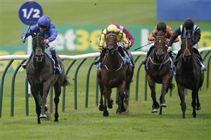 NEWMARKET, ENGLAND - OCTOBER 08: William Buick riding Al Suhail (blue) win The Godolphin Stud & Stable Staff Awards Challenge Stakes at Newmarket Racecourse on October 08, 2021 in Newmarket, England. (Photo by Alan Crowhurst/Getty Images)