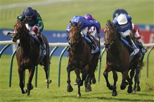 NEWMARKET, ENGLAND - OCTOBER 09: James Doyle riding Goldspur (R, white cap) win The Godolphin Flying Start Zetland Stakes at Newmarket Racecourse on October 09, 2021 in Newmarket, England. (Photo by Alan Crowhurst/Getty Images)