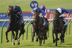 NEWMARKET, ENGLAND - OCTOBER 09: James Doyle riding Goldspur (R, white cap) win The Godolphin Flying Start Zetland Stakes at Newmarket Racecourse on October 09, 2021 in Newmarket, England. (Photo by Alan Crowhurst/Getty Images)