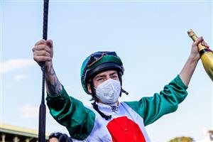 SYDNEY, AUSTRALIA - OCTOBER 09: Robbie Dolan salutes after winning race 8 the Moet & Chandon Spring Champion Stakes on Profondo during Sydney Racing at Royal Randwick Racecourse on October 09, 2021 in Sydney, Australia. (Photo by Mark Evans/Getty Images)