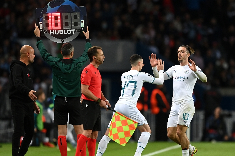 Phil Foden of Manchester City replaces teammate Jack Grealish during the UEFA Champions League