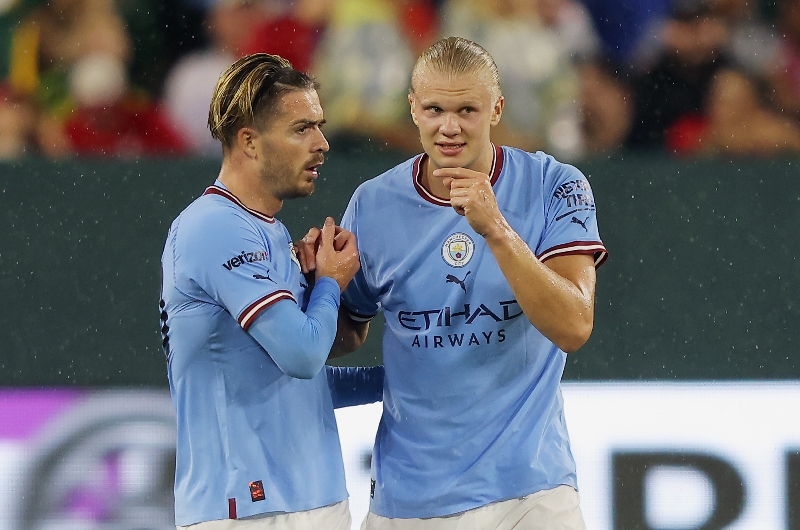 Erling Haaland and Jack Grealish of Manchester City